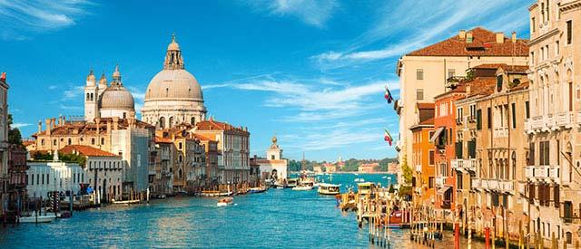 Italian city with blue water and sky